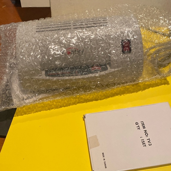 Laminating Machine, Instruction Booklet, and Package of Laminating Sleevrs - Picture 1 of 7
